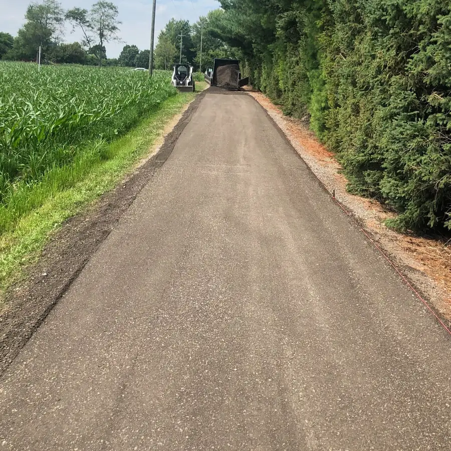 Compacted recycled asphalt millings driveway